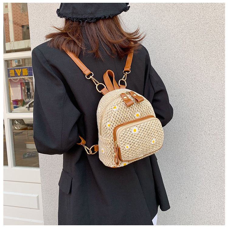 Olivia | Ibiza Daisy Embroidered Straw Backpack